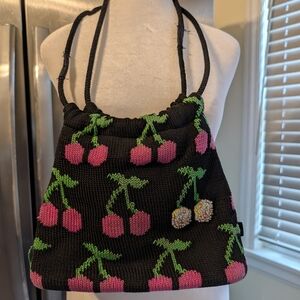 The Sak Black Knit Shoulder Bag with Pink Cherry Motif